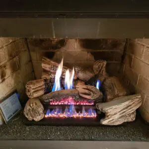 gas fireplace log set with glowing embers